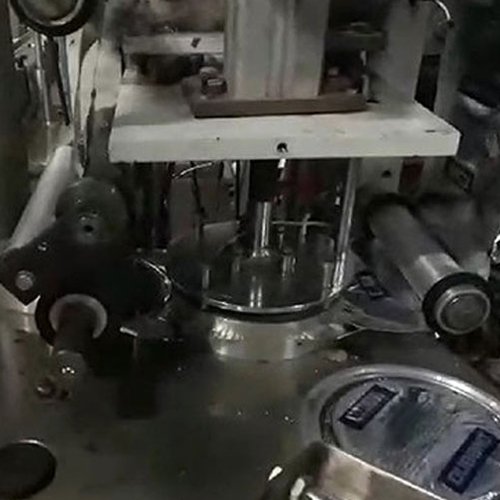 image of machpack's liquid filling with conduction sealing machine